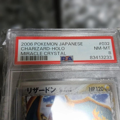2006 Pokemon Holo Charizard Miracle Crystal #032 collectible card graded NM-MT