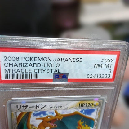 2006 Pokemon Holo Charizard Miracle Crystal #032 collectible card graded NM-MT