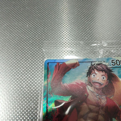 Unopened One Piece Monkey D. Luffy card with 5000 attack power and black yellow leader color from Seven Eleven promo