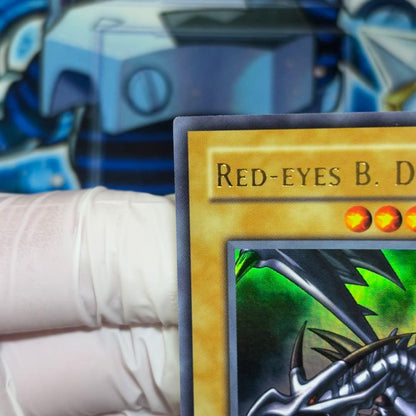 Yu-Gi-Oh Red-Eyes Black Dragon Legend of Blue Eyes White Dragon Ultra Rare card in double sleeve loader