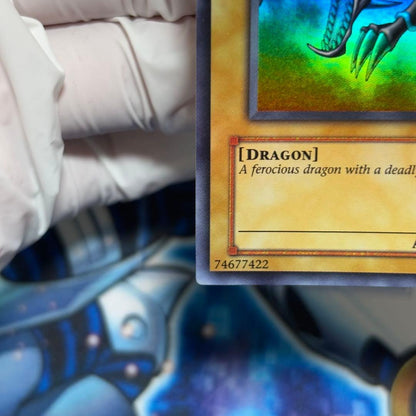 Yu-Gi-Oh Red-Eyes Black Dragon Legend of Blue Eyes White Dragon Ultra Rare card in double sleeve loader