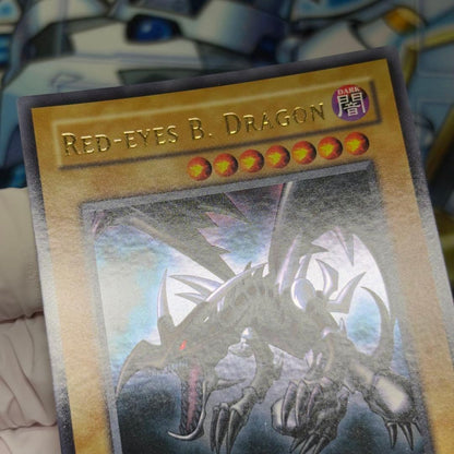 Yu-Gi-Oh Red-Eyes Black Dragon Legend of Blue Eyes White Dragon Ultra Rare card in double sleeve loader