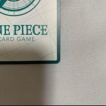 One Piece Uta Don Card Super Parallel in protective sleeve and rigid case