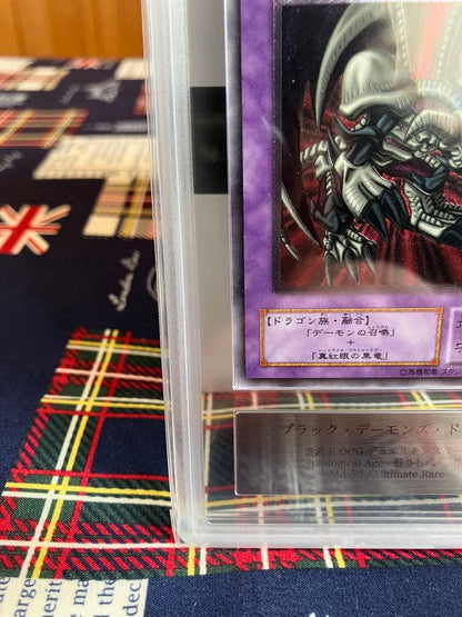 Yugi-Oh Black Demons Dragon Relief ARS9 trading card in appraisal case from Japan with visible minor scratches
