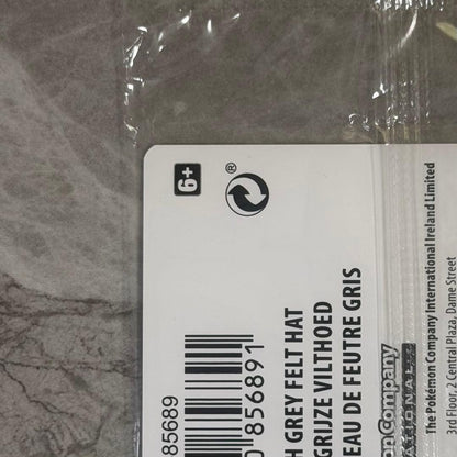 Unopened Gogh Pikachu figure wearing grey felt hat with minor white scratch on lower left side
