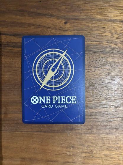One Piece Portgas D. Ace OP13-119 trading card with slight white specks and fold at lower right edge