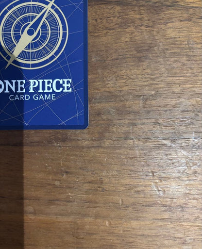 One Piece Portgas D. Ace OP13-119 trading card with slight white specks and fold at lower right edge