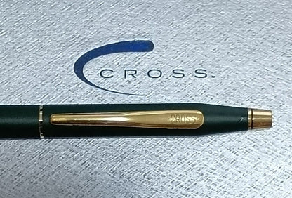 Vintage Cross Classic Century green and gold twist ballpoint pen with minor scratches and gold tarnish