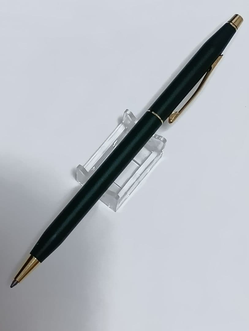 Vintage Cross Classic Century green and gold twist ballpoint pen with minor scratches and gold tarnish
