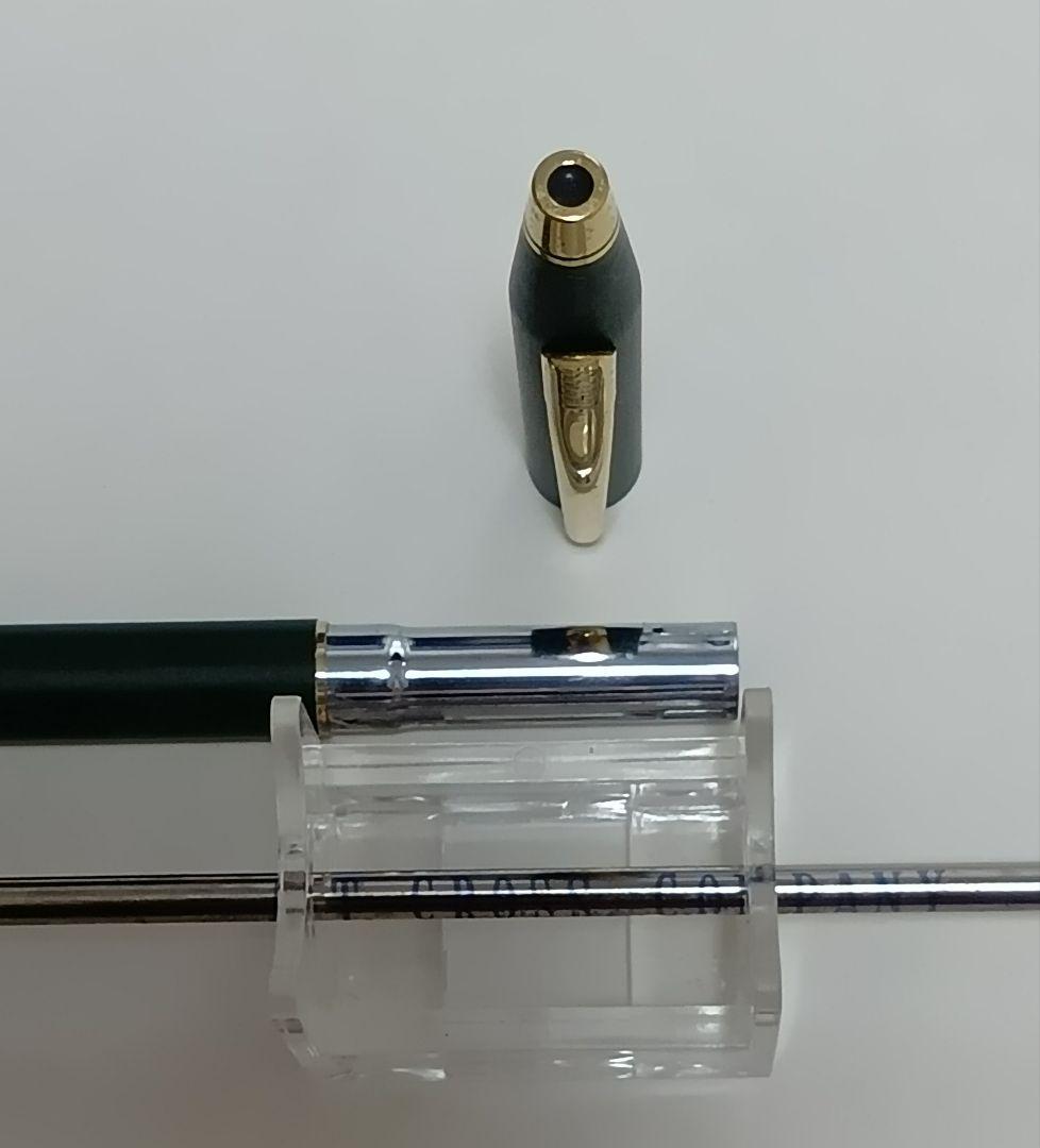Vintage Cross Classic Century green and gold twist ballpoint pen with minor scratches and gold tarnish