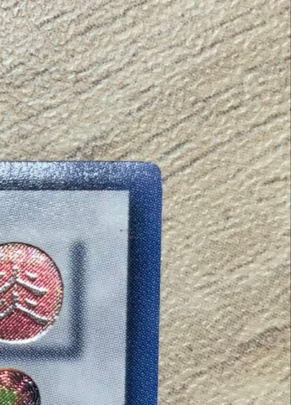 Vintage Yu-Gi-Oh Black Rose Dragon Japanese relief card with visible signs of age and wear