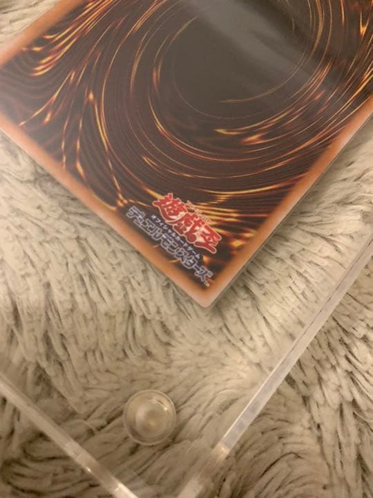 Genuine Japanese Yugioh Blue-Eyes White Dragon Leaf SM-51 trading card in good used condition