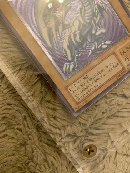 Genuine Japanese Yugioh Blue-Eyes White Dragon Leaf SM-51 trading card in good used condition