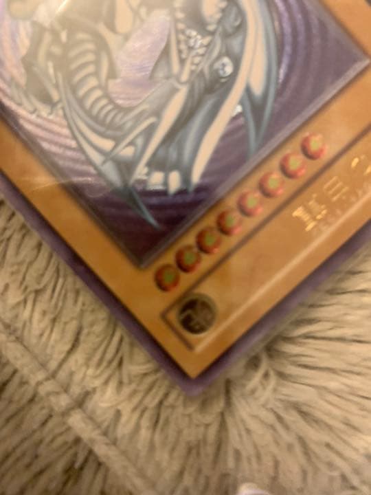Genuine Japanese Yugioh Blue-Eyes White Dragon Leaf SM-51 trading card in good used condition