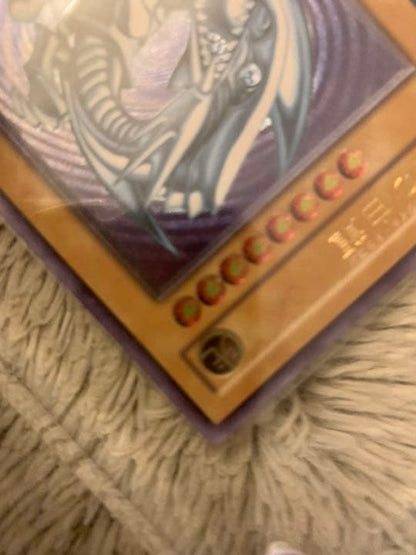 Genuine Japanese Yugioh Blue-Eyes White Dragon Leaf SM-51 trading card in good used condition