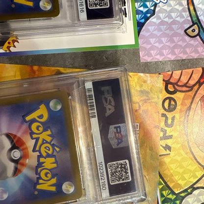 2023 Pokemon Card Set featuring Magikarp Art Rare and Erika's Invitation Super Rare, both graded PSA 10