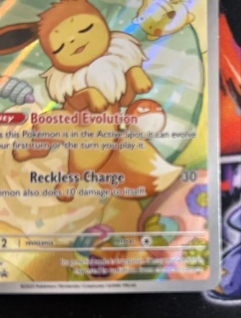 Eevee Start Deck 100 Battle Collection 755/742 International Edition collectible card with visible scratch