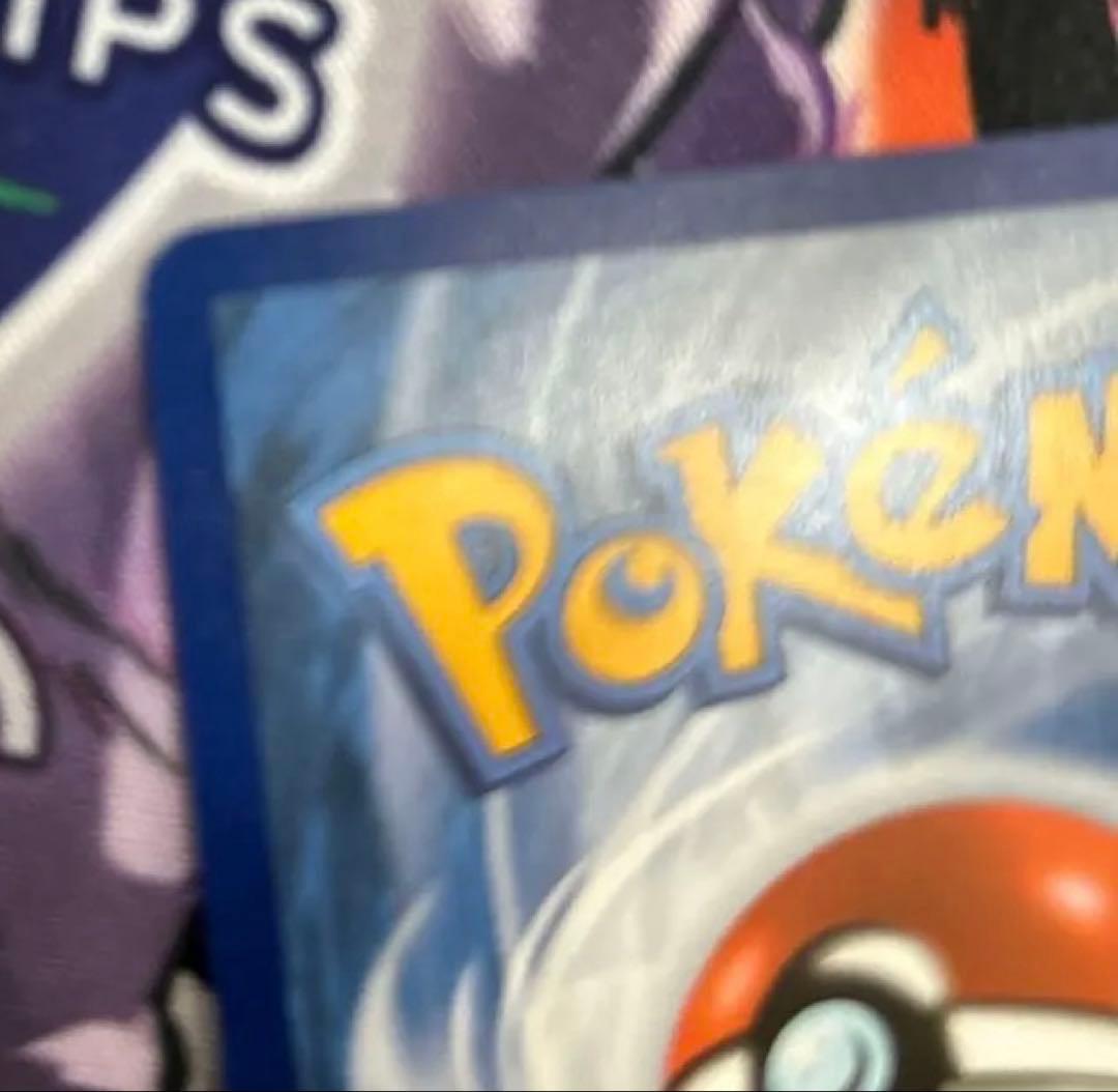 Eevee Start Deck 100 Battle Collection 755/742 International Edition collectible card with visible scratch