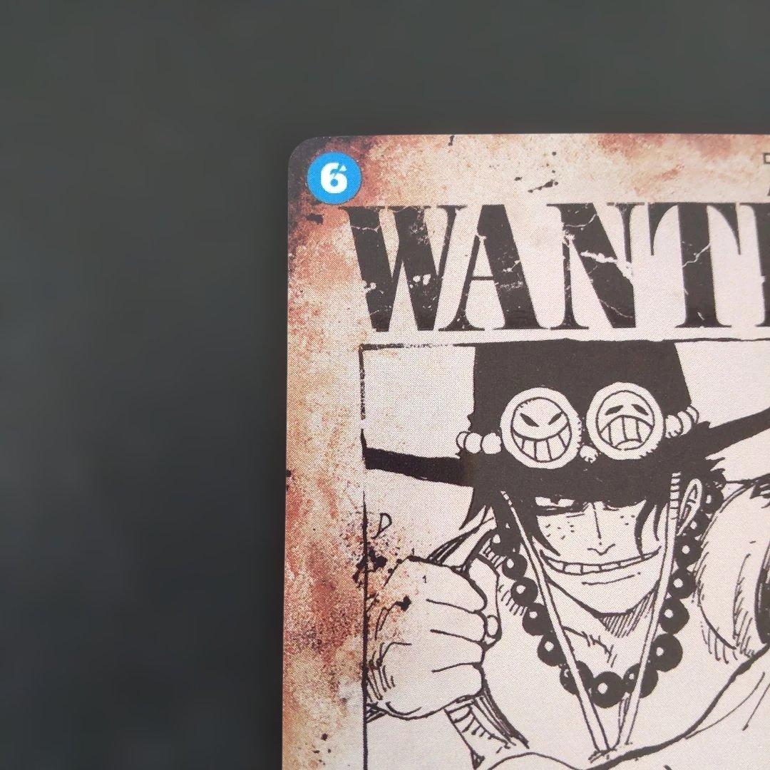 One Piece Monkey D. Luffy OP13-119 character card featuring Portgas D. Ace with white damage corner