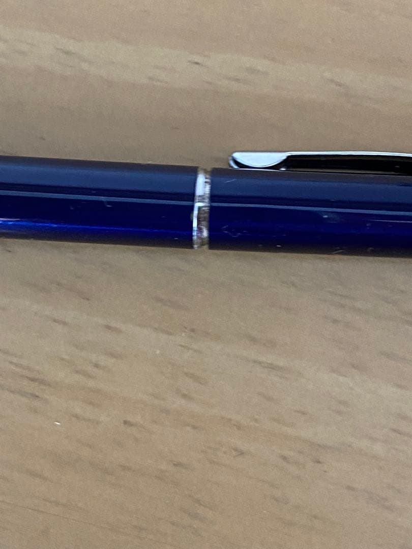 Cross Twist ballpoint pen body with blue finish and silver accents shown from side view