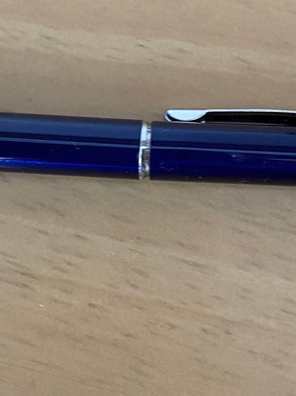 Cross Twist ballpoint pen body with blue finish and silver accents shown from side view