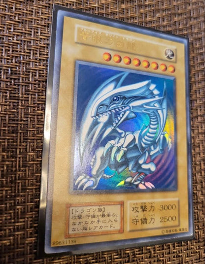 Yugioh Blue-Eyes White Dragon Early Ultra Rare Japanese trading card from a complete unused collection
