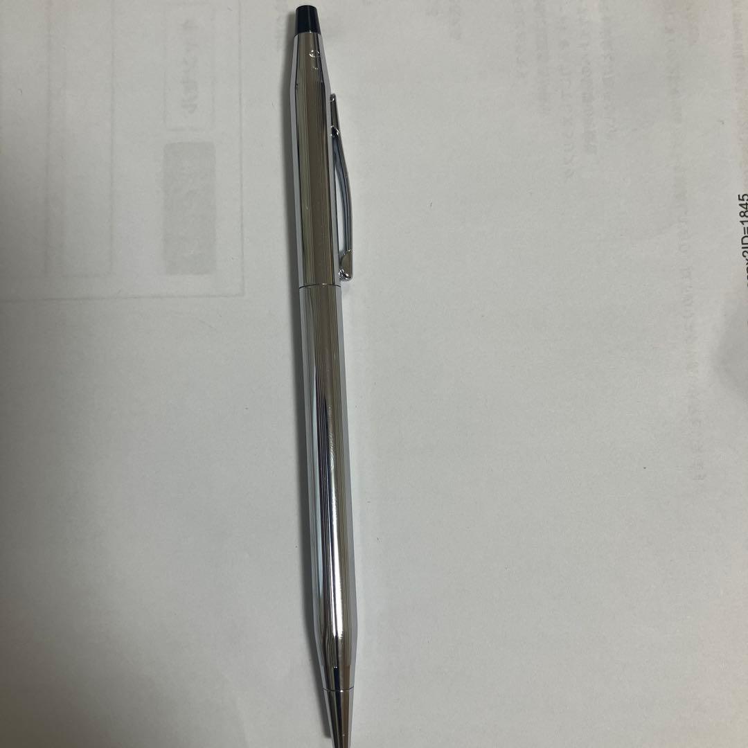 Cross ballpoint pen with black ink and twist-type mechanism on a white background