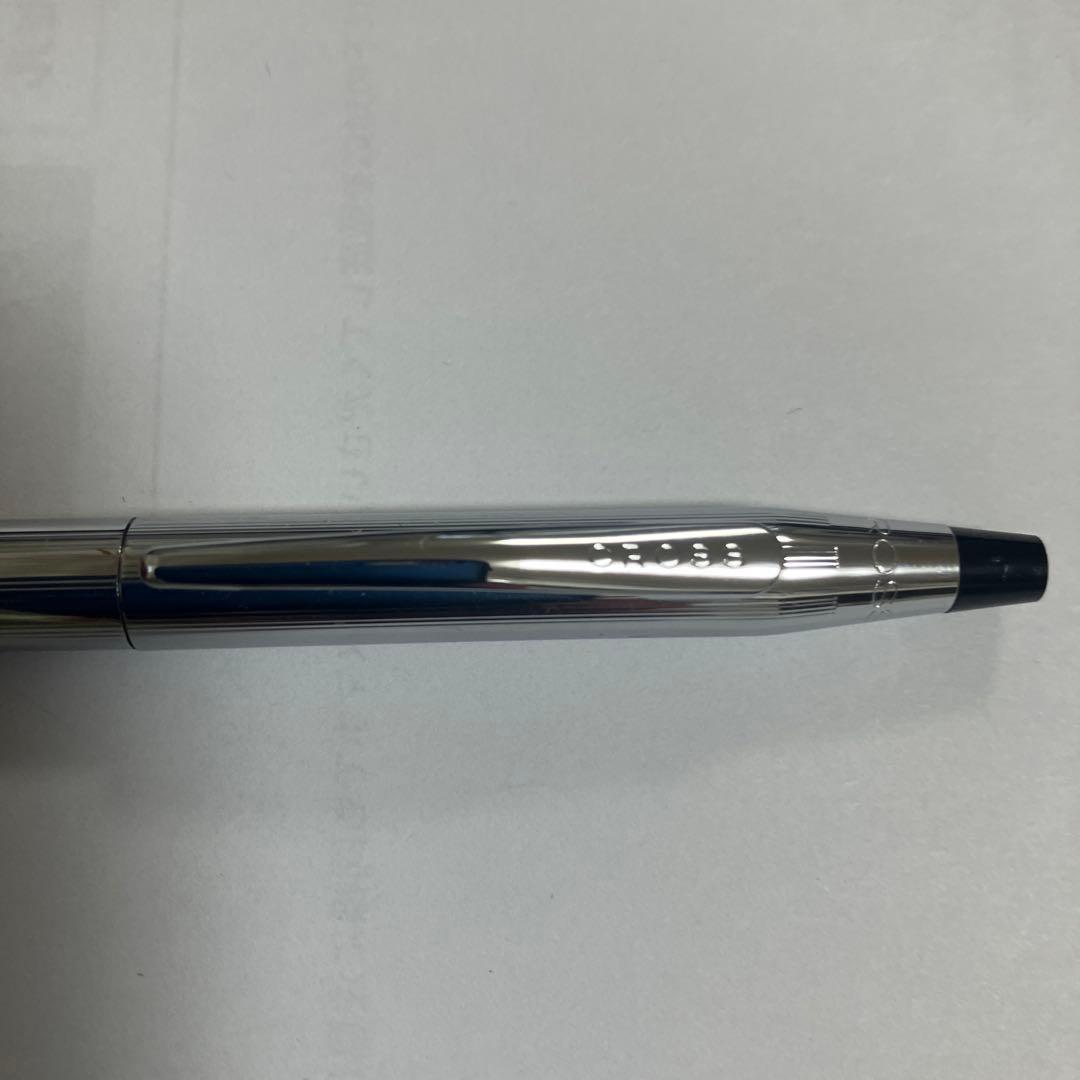 Cross ballpoint pen with black ink and twist-type mechanism on a white background