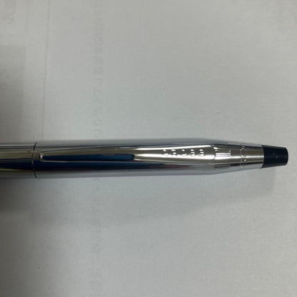 Cross ballpoint pen with black ink and twist-type mechanism on a white background