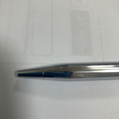 Cross ballpoint pen with black ink and twist-type mechanism on a white background