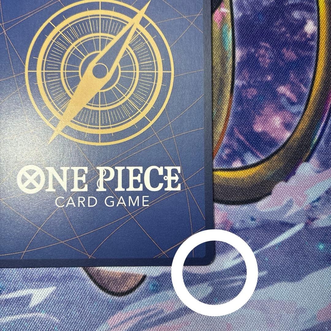 One Piece Monkey D Luffy P-033 collectible card with visible dirt and scratch on white circle area
