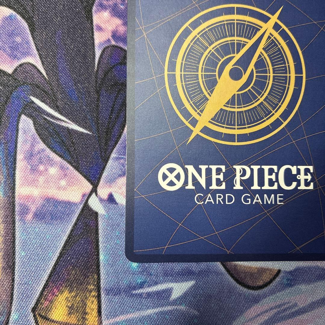 One Piece Monkey D Luffy P-033 collectible card with visible dirt and scratch on white circle area