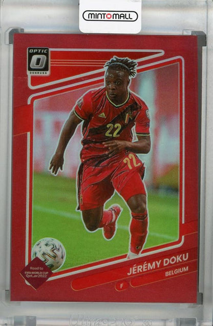 2021-22 Donruss Soccer Road to Qatar Belgium Jeremy Doku Base Optic Red card numbered 085/149 with minor stain