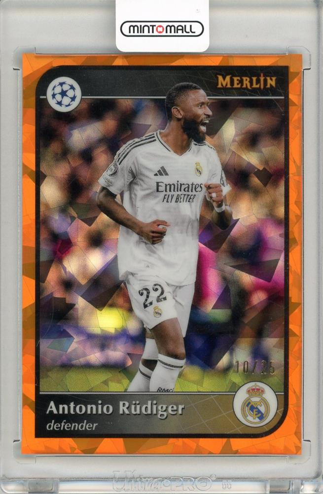2024-25 Topps Merlin UEFA Club Competitions Antonio Rüdiger Orange Atomic 10/25 trading card featuring Real Madrid C.F.