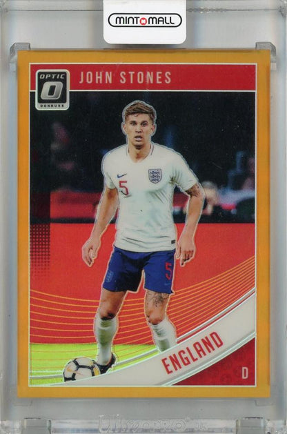 2018-19 Panini Donruss John Stones Orange #128 collectible card serial number 76/99 with visible damage and dirt