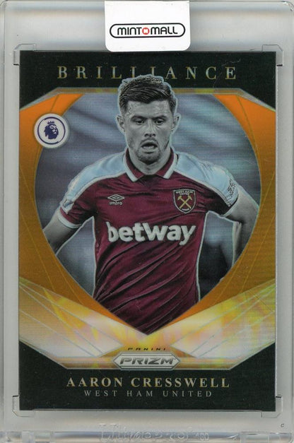 2021-22 PANINI Prizm EPL Aaron Cresswell Brilliance Prizms Orange trading card numbered 01 of 25