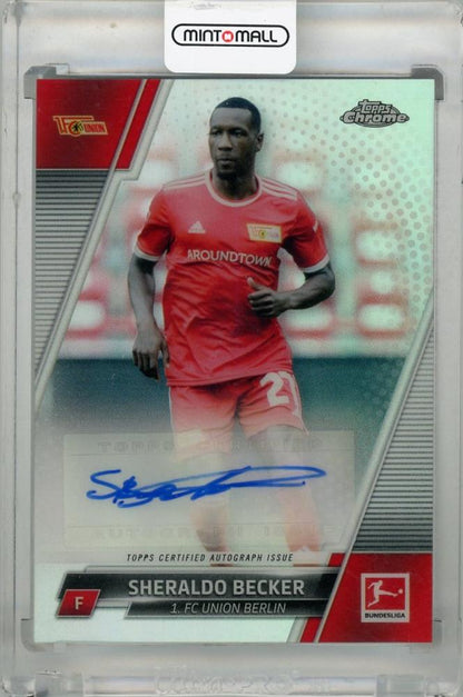 2021-22 Topps Chrome Bundesliga Sheraldo Becker Autograph trading card with visible back damage