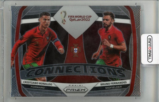 2022 PANINI PRZM FIFA WORLD CUP trading card featuring Cristiano Ronaldo and Bruno Fernandes #7 Portugal