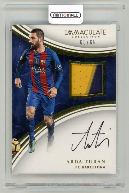 2017 Panini Immaculate Collection Arda Turan patch autograph card numbered 63 out of 65 from FC Barcelona