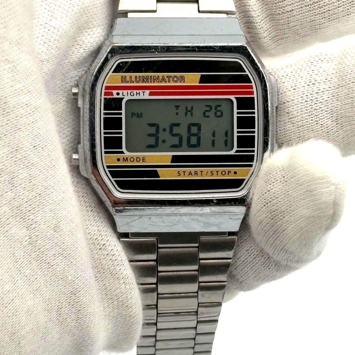 Casio A168WE silver digital vintage retro watch with illuminator feature displayed on white background