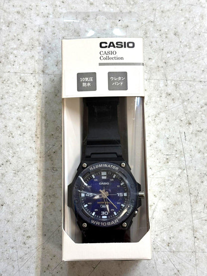 Casio MW-620H-2AJF watch with blue resin case and strap showing analog display and LED backlight