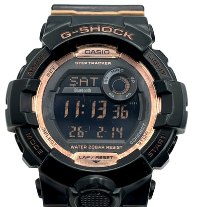 Casio G-Shock GMD-B800 black digital watch with gold bezel and Bluetooth connectivity