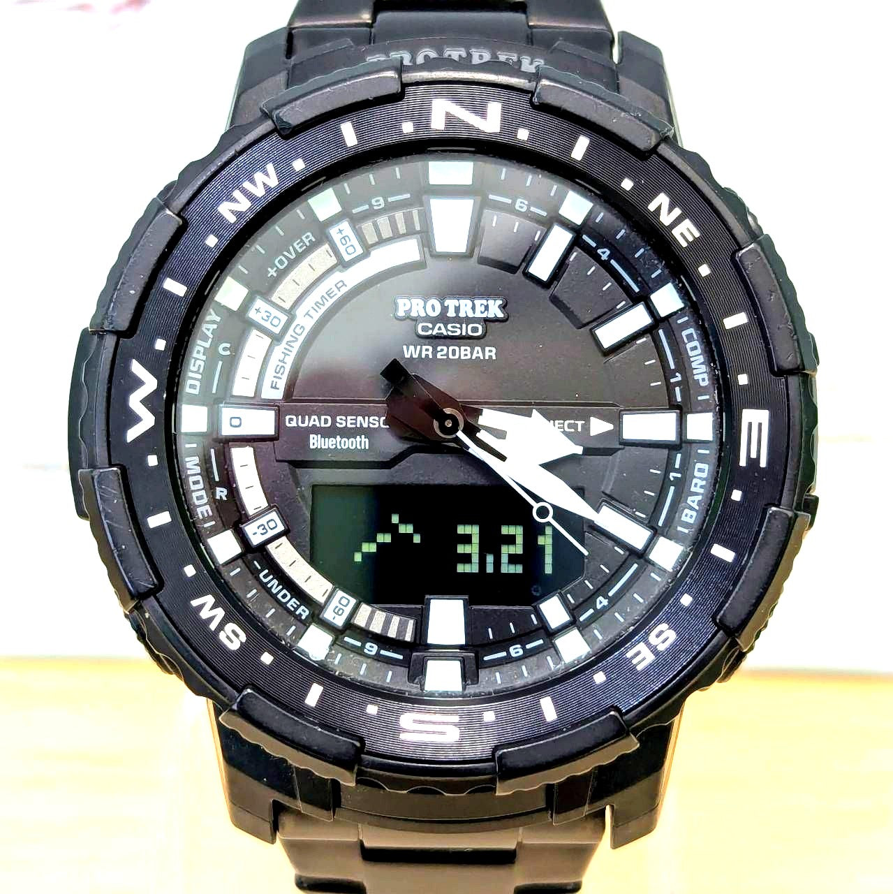 Casio Pro Trek Angler Line PRT-B70 metal bracelet watch showing fishing timer and tide graph features