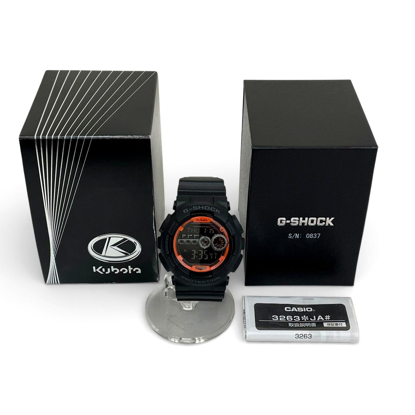 Casio G-Shock GD-100 Kubota Model watch in black with orange accents and box