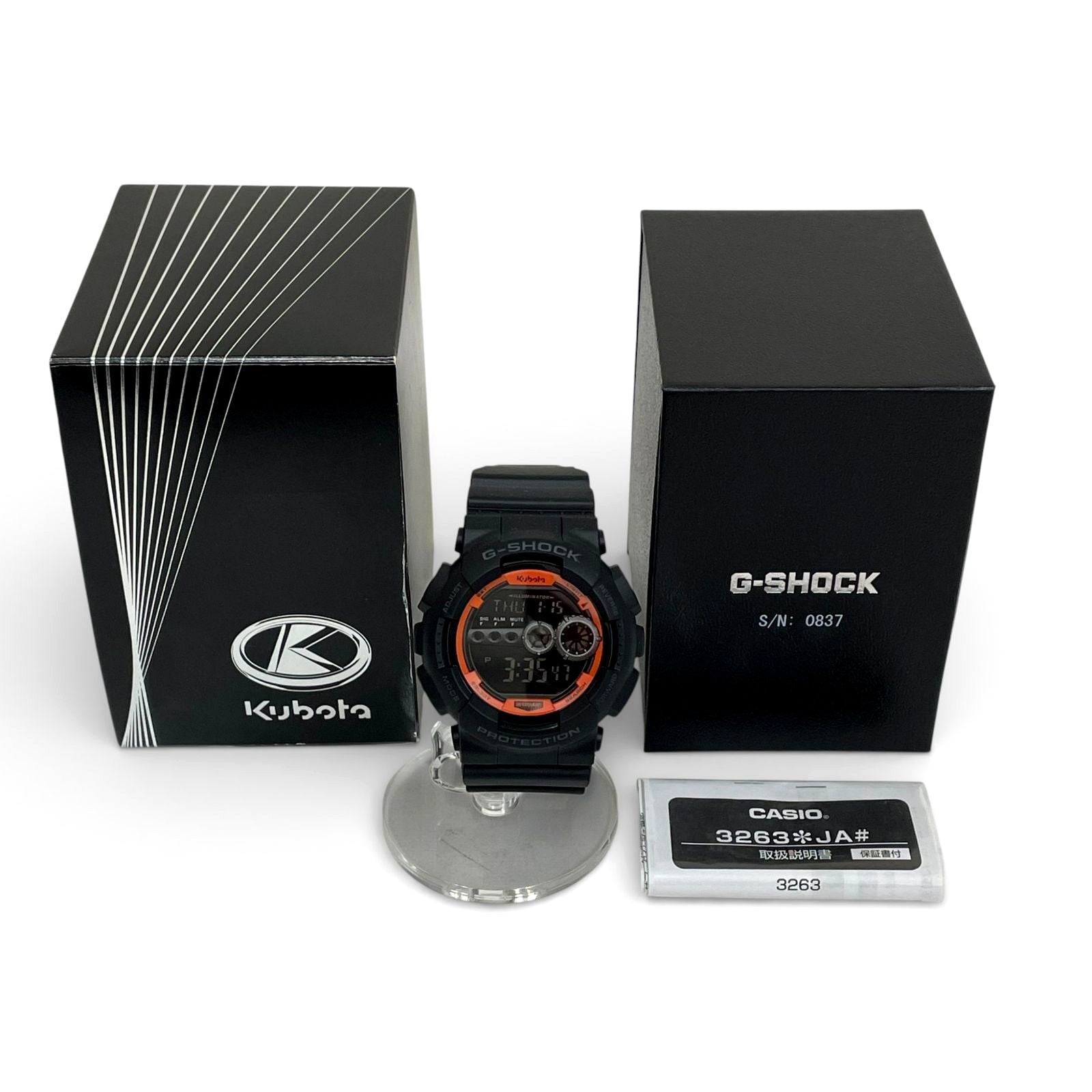 Casio G-Shock GD-100 Kubota Model watch in black with orange accents and box