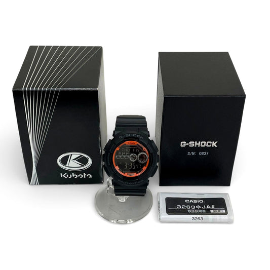 Casio G-Shock GD-100 Kubota Model watch in black with orange accents and box