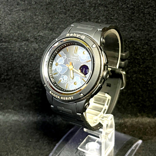 Casio Baby-G BGA-150FL digital watch with black flower pattern on strap and face