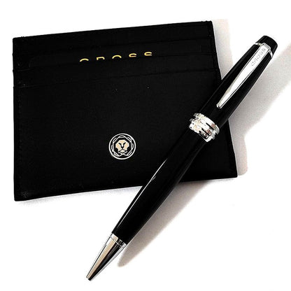 Cross Bailey black ballpoint pen with brass lacquer finish alongside matching card case and gift box