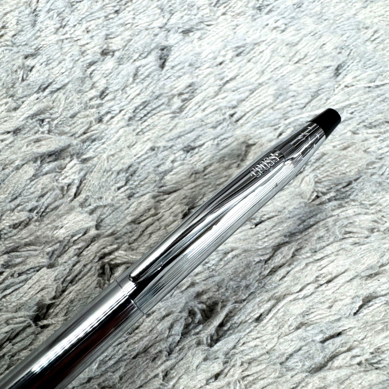 Cross Twist ballpoint pen with blue ink, Japan import, showing small scratches and twist-style design