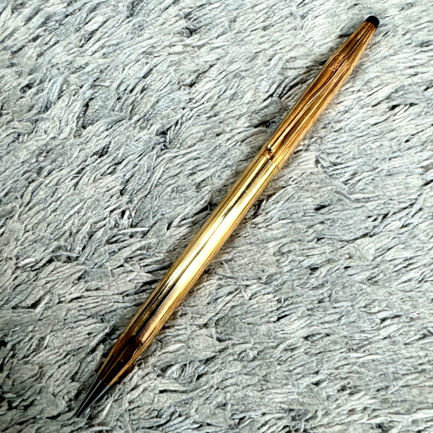 Cross 14KT gold twist mechanical pencil with slight scratches and light stains shown with its case